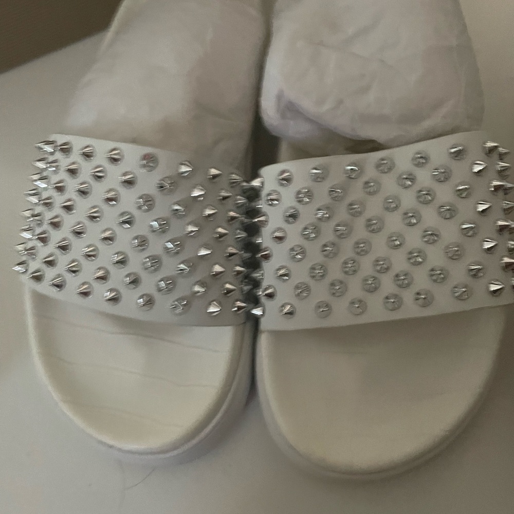 Christian louboutin size 38 pool slide white with silver spike New.